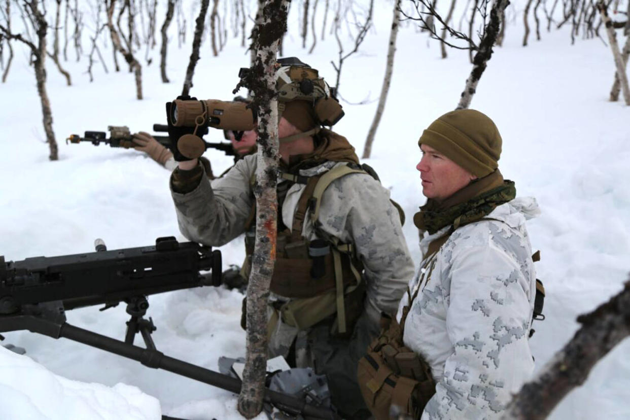 Lt. Col. Thomas Driscoll of the 2nd Marine Regiment, right, visits troops in trenches dug into the Arctic ice in northern Norway. (Carlo Angerer / NBC News)