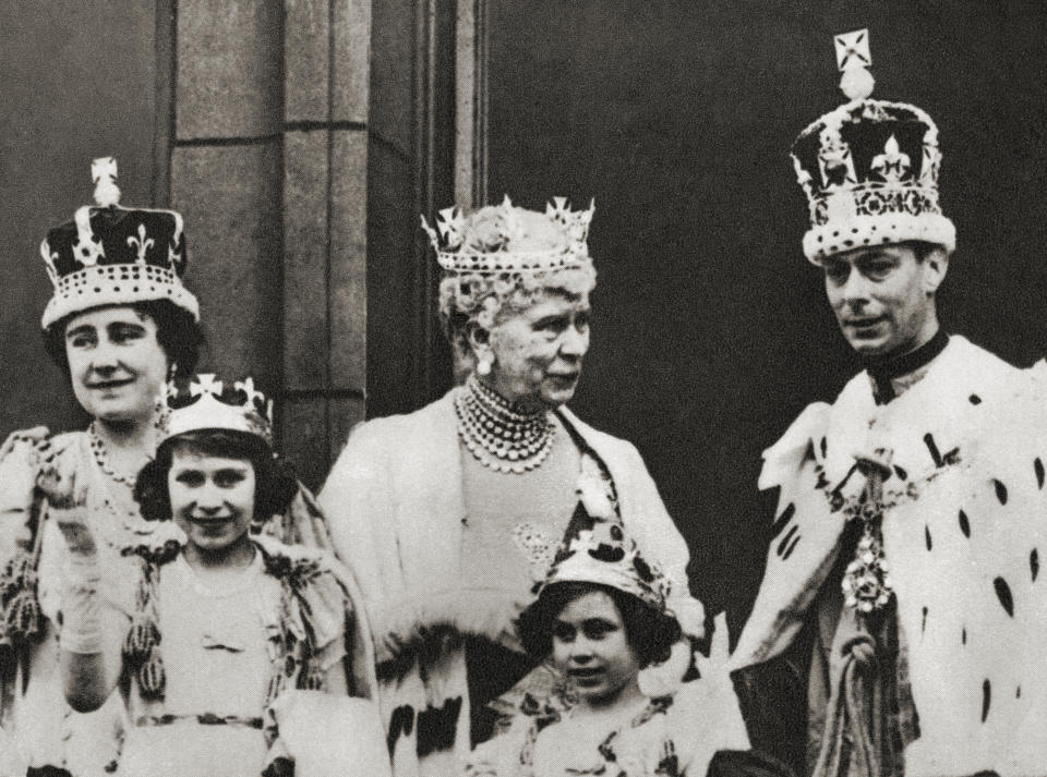 King George VI and his wife Queen Elizabeth seen here on the balcony at Buckingham Palace, London, England the day of their coronation, 12 May, 1937, with their daughters Princess Margaret and Princess Elizabeth, future Queen Elizabeth II and the king's mother Mary of Teck. George VI, 1895 – 1952, King of the United Kingdom. Elizabeth Angela Marguerite Bowes-Lyon, 1900 – 2002. Queen consort of the United Kingdom as the wife of King George VI. Princess Margaret, later Countess of Snowdon, 1930 – 2002. Princess Elizabeth, later Queen Elizabeth II, born 1926. Mary of Teck, 1867 – 1953. Queen consort of the United Kingdom and the British Dominions, and Empress consort of India, as the wife of King-Emperor George V. From The Coronation of King George VI and Queen Elizabeth, published 1937. (Photo by: Universal History Archive/Universal Images Group via Getty Images)