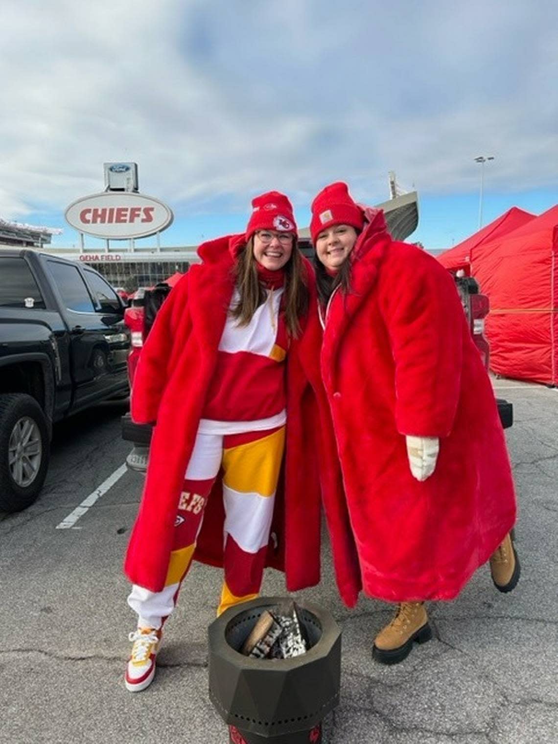 Destinie Geisinger, left, and her best friend Jessica McDougall drove six and a half hours to make it to Sunday’s game. The daughter of a longtime Chiefs fan, Geisinger tried to bring the team luck.