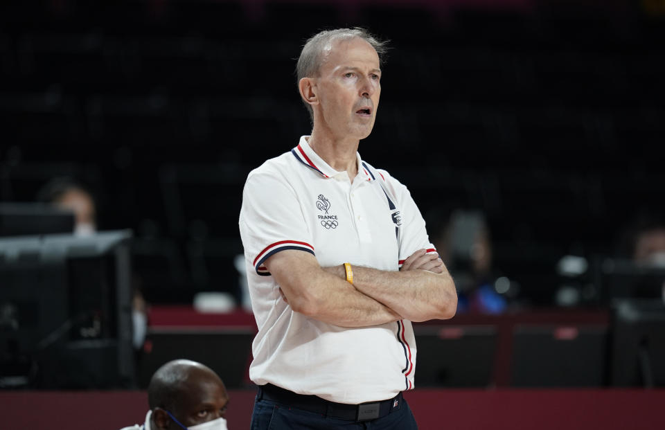 France's head coach Vincent Collet watches during men's basketball preliminary round game between Iran and France at the 2020 Summer Olympics, Saturday, July 31, 2021, in Saitama, Japan. (AP Photo/Charlie Neibergall)