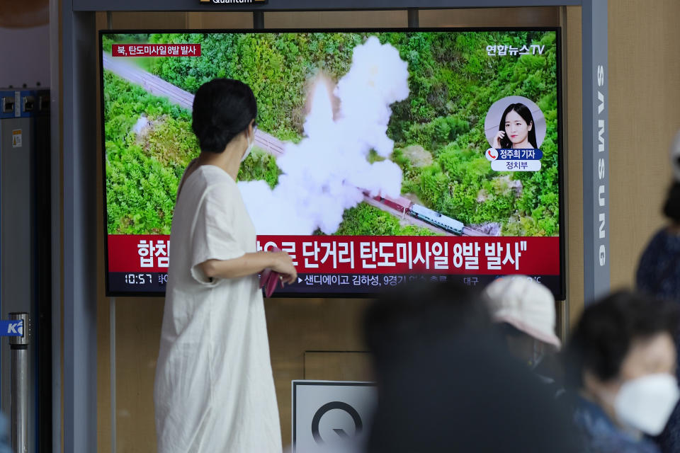 People watch a TV screen showing a news program reporting about North Korea's missile launch with file footage, at a train station in Seoul, South Korea, Sunday, June 5, 2022. North Korea test-fired a salvo of multiple short-range ballistic missiles toward the sea on Sunday, South Korea's military said, extending a provocative streak in weapons demonstrations this year that U.S. and South Korean officials say may culminate with a nuclear test explosion. (AP Photo/Lee Jin-man)
