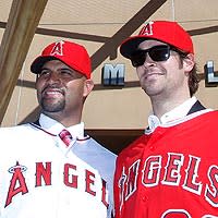 Landing Albert Pujols and C.J. Wilson could help the Angels raise another World Series banner