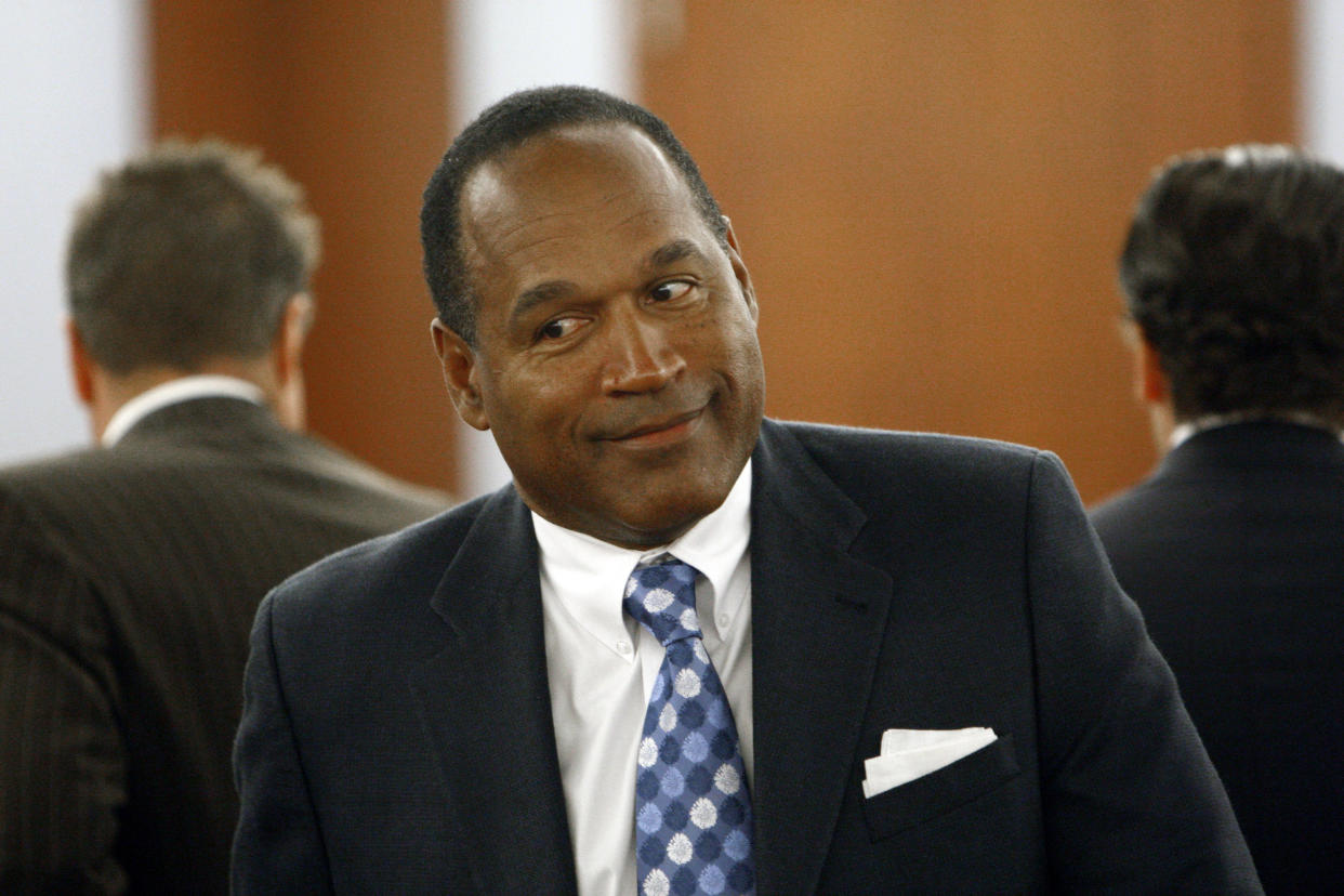 O.J. Simpson appears in court during a preliminary hearing at the Clark County Regional Justice Center in Las Vegas, Nevada November 13, 2007.  Simpson and two co-defendant are facing charges relating to an alleged robbery at a Las Vegas hotel room in September 2007. REUTERS/ Andrew Gombert/pool (UNITED STATES)