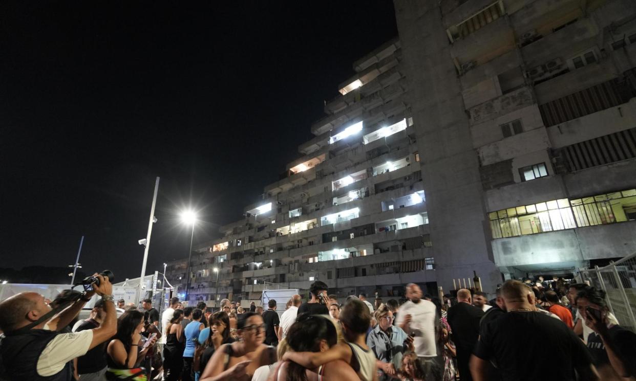 <span>About 800 people were evacuated from the Vela Celeste complex in Scampia on Monday night.</span><span>Photograph: Cesare Abbate/EPA</span>