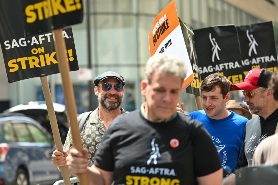 Corey Stoll, Alex Edelman and Jason Sudeikis join members of the Writers Guild of America East and SAG-AFTRA as they walk the picket line outside NBC Rockefeller Center on July 14, 2023 in New York City.