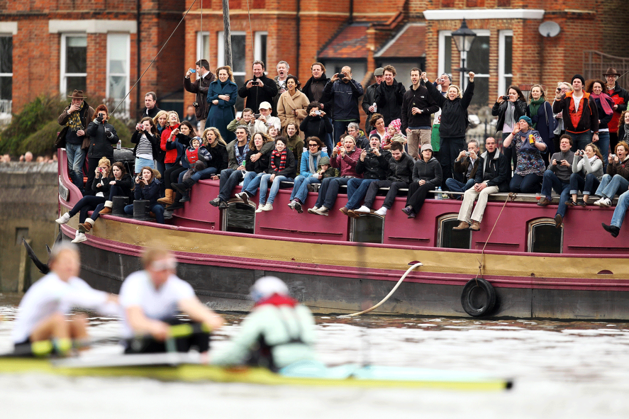 Boat race 2015: Spectators cheer during the Oxford and Cambridge University Boat Race (Picture: Getty): Richard Heathcote/Getty Images