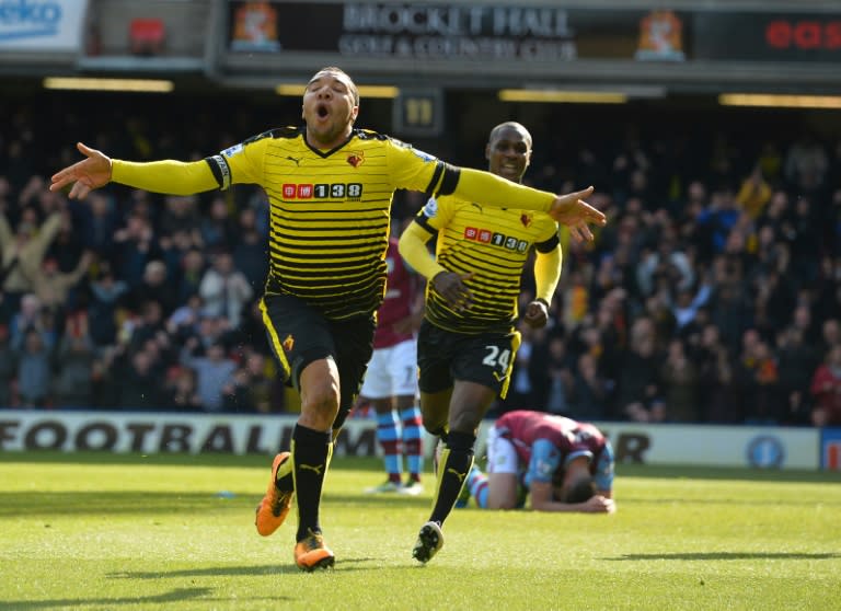 Watford's striker Troy Deeney (L) celebrates after scoring his second goal during the English Premier League match against Aston Villa on April 30, 2016