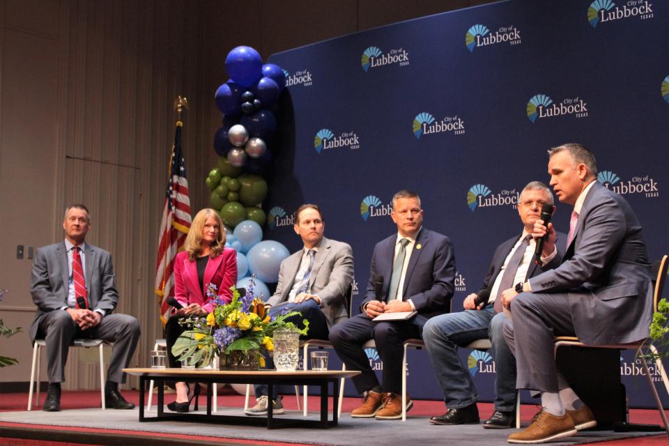 Lubbock Mayor Tray Payne, right, hosts a panel discussion with city staff during the annual State of the City Address Wednesday at the Lubbock Memorial Civic Center.