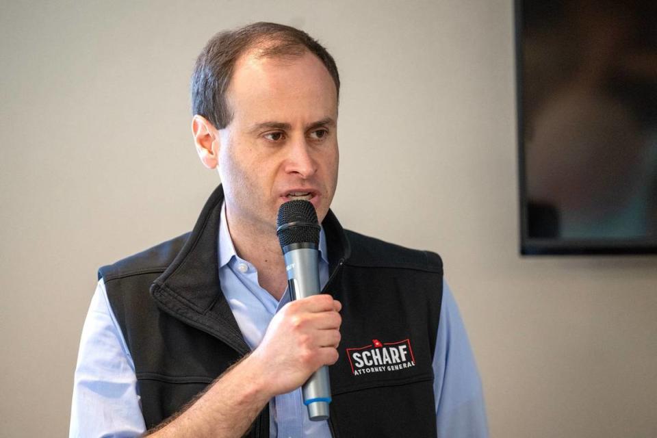 Will Scharf, a Republican candidate for Missouri Attorney General and an attorney for Donald Trump, speaks to members of the Jackson County Republican Party about the attempted assassination of former President Donald Trump. Scharf spoke during a GOP ice cream social in Kansas City on Sunday, July 14, 2022.