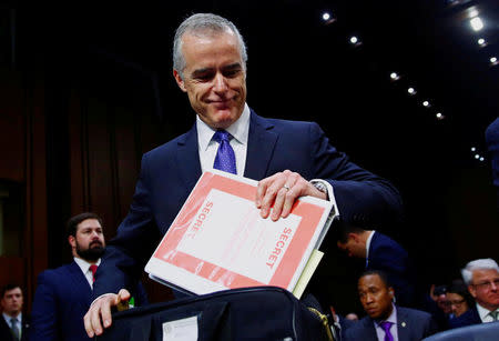 FILE PHOTO: Acting FBI Director Andrew McCabe arrives to testify before the U.S. Senate Select Committee on Intelligence on Capitol Hill in Washington, U.S. May 11, 2017. REUTERS/Eric Thayer