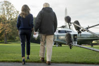 <p>President Donald Trump and first lady Melania Trump walk to board Marine One on the South Lawn of the White House in Washington, Tuesday, Oct. 3, 2017, for a short trip to Andrews Air Force Base, Md. and then on to Puerto Rico. (Photo: Andrew Harnik/AP) </p>