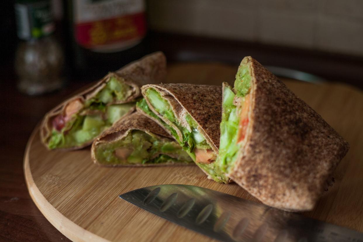 Vegan powers on the rise with avocado and hummus wrap