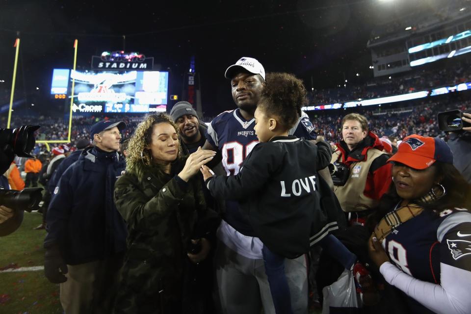 <p>Martellus Bennett #88 of the New England Patriots celebrates with family members after defeating the Pittsburgh Steelers 36-17 to win the AFC Championship Game at Gillette Stadium on January 22, 2017 in Foxboro, Massachusetts. (Photo by Elsa/Getty Images) </p>