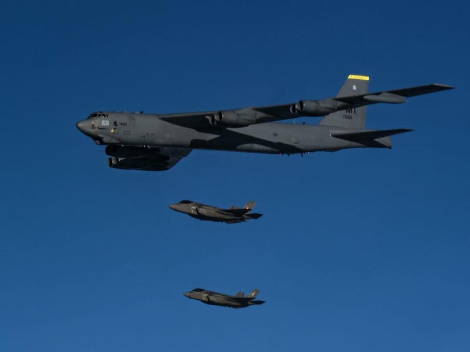 US B-52 bomber with Italian F-35s