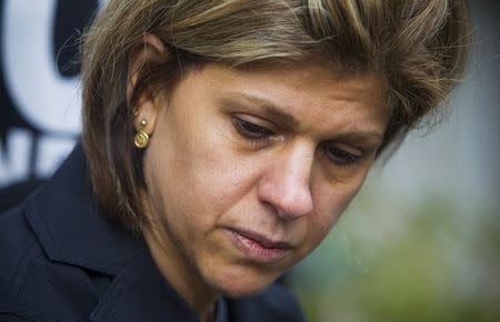 Tima Kurdi, sister of Syrian refugee Abdullah Kurdi whose sons Aylan and Galip and wife Rehan were among 12 people who drowned in Turkey trying to reach Greece, cries while speaking to the media outside her home in Coquitlam, British Columbia September 3, 2015. REUTERS/Ben Nelms