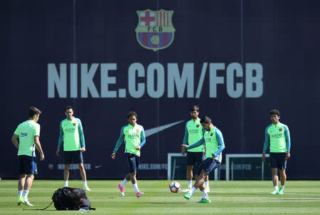 Soccer Football - Barcelona training session - La Liga - Joan Gamper training camp, Barcelona, Spain - 22/4/2017 - Barcelona's players plays with a ball during a training session. REUTERS/Albert Gea