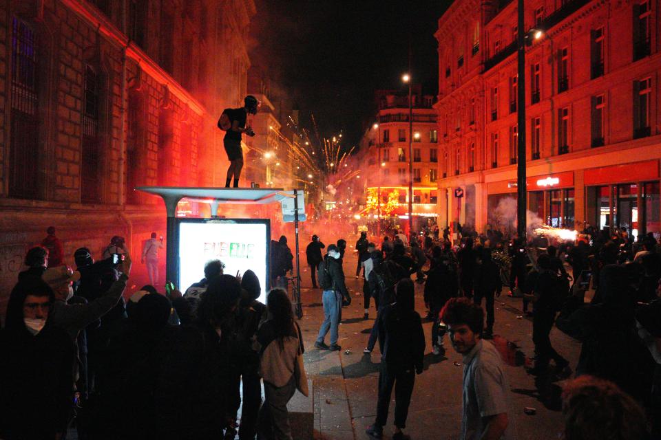 Demonstrators clash with police during a protest following the legislative election results on 7 July 2024 in Paris, France (Getty Images)