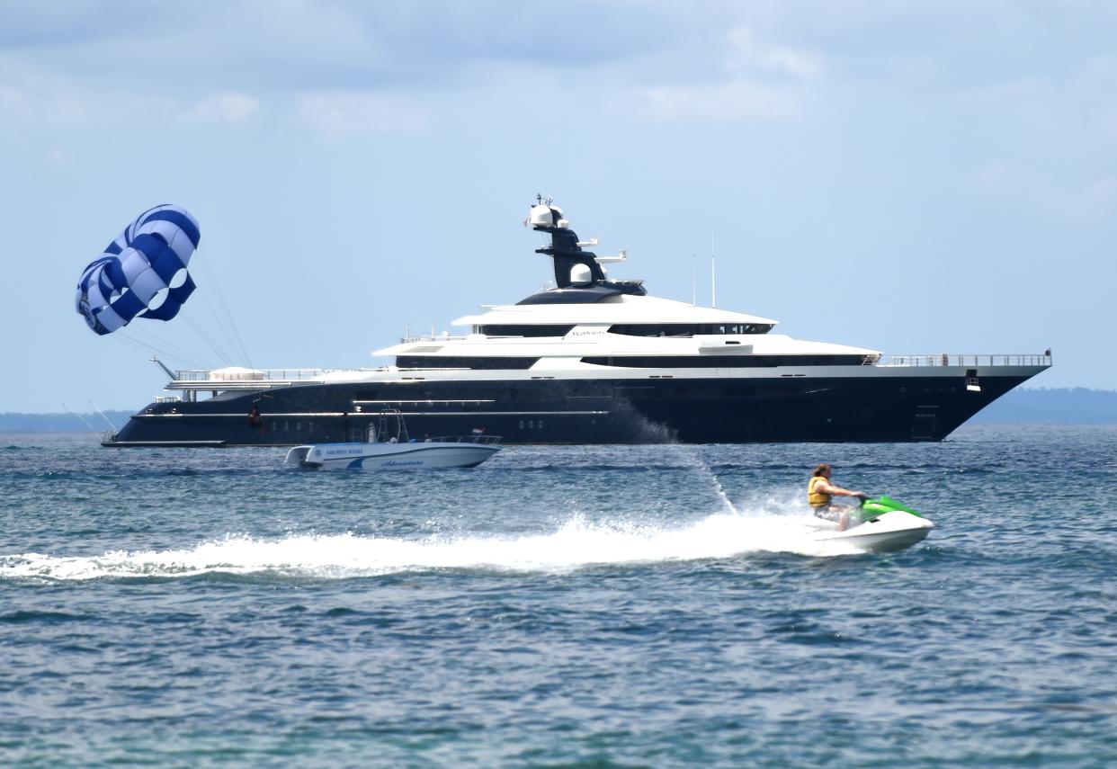 The Cayman Island-registered vessel Equanimity, which is reportedly worth some 250 million USD and is owned by Jho Low, a former unofficial adviser to the Malaysian fund 1MDB, sits in waters off Tanjung Benoa on the Indonesia's resort island of Bali on April 4, 2018. Indonesian police on February 28 boarded and searched the luxury vessel Equanimity which was being sought by US investigators as part of their probe into Malaysian state fund 1MDB. / AFP PHOTO / SONNY TUMBELAKA        (Photo credit should read SONNY TUMBELAKA/AFP/Getty Images)