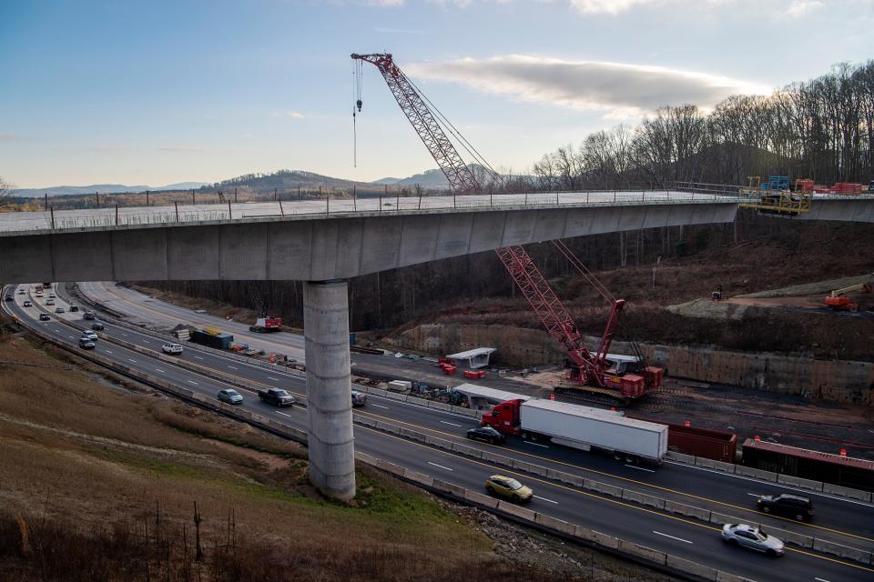 The $14.5 million project to replace the existing bridge on the Blue Ridge Parkway is considered a necessary measure to accommodate the road-widening to the interstate below.