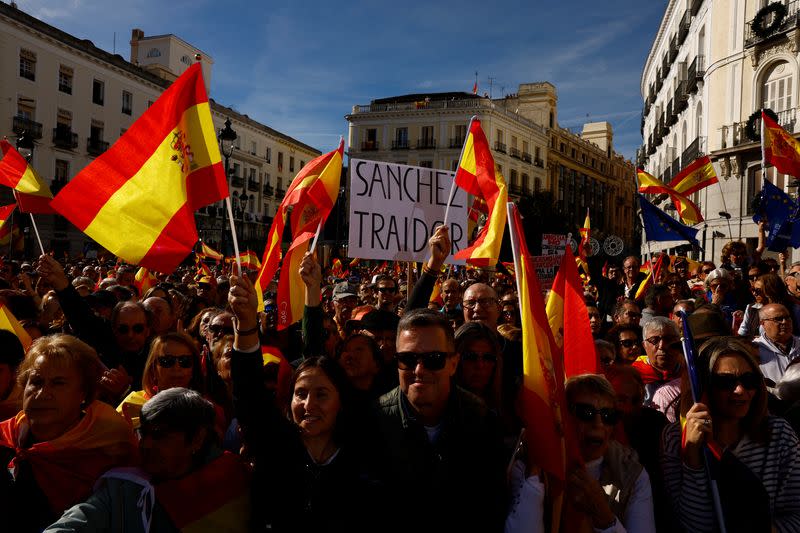 Protest after Spain's socialists reached a deal with the Catalan separatist Junts party for government support, in Madrid