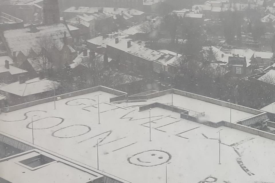 A message written on top of a car park in the snow outside Royal Hallamshire Hospital (Paul Harris/PA) (Paul Harris/PA)