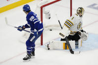 Toronto Maple Leafs' William Nylander (88) scores against Boston Bruins goaltender Jeremy Swayman (1) during third-period action in Game 6 of an NHL hockey Stanley Cup first-round playoff series in Toronto, Thursday, May 2, 2024. (Frank Gunn/The Canadian Press via AP)