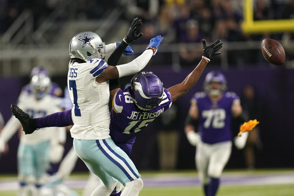 Dallas Cowboys defensive back Trevon Diggs (7) breaks up a pass intended for Minnesota Vikings wide receiver Justin Jefferson (18) during the second half of an NFL football game, Sunday, Oct. 31, 2021, in Minneapolis. (AP Photo/Jim Mone)