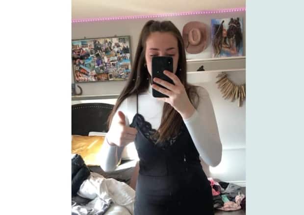 Karis Wilson, 17, was sent home from school Tuesday for wearing this outfit her teacher described as inappropriate clothing. 