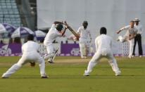 Cricket - Bangladesh v England - Second Test cricket match - Sher-e-Bangla Stadium, Dhaka, Bangladesh - 29/10/16. Bangladesh's Mohammad Mahmudullah (2nd L) plays a shot off the bowling of England's Ben Stokes. REUTERS/Mohammad Ponir Hossain