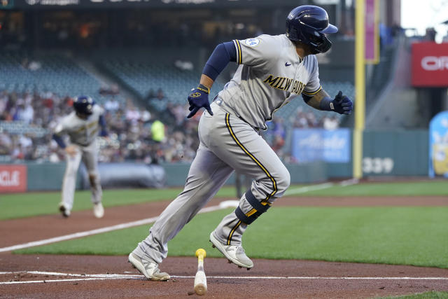 Milwaukee Brewers' Omar Narvaez runs to first base after hitting an RBI-single against the San Francisco Giants during the first inning of a baseball game in San Francisco, Monday, Aug. 30, 2021. (AP Photo/Jeff Chiu)