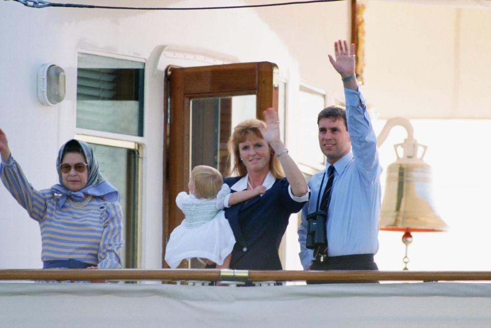 <p>In this photo from 1989, the Queen, Prince Andrew, and Sarah Ferguson, wave before they leave for their summer cruise. Princess Beatrice wanted nothing to do with the picture, though. <br></p>