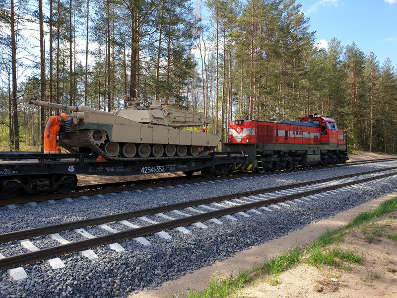 U.S. Abrams tank is loaded on rail in Pabrade training ground