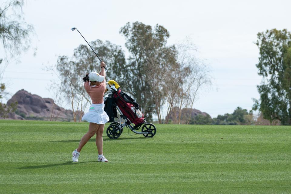 Arizona State University golfer Ashley Menne takes her second stroke at the 12th hole at Papago Golf Club during the "Dual in the Desert" match on Feb. 25, 2024, in Phoenix.