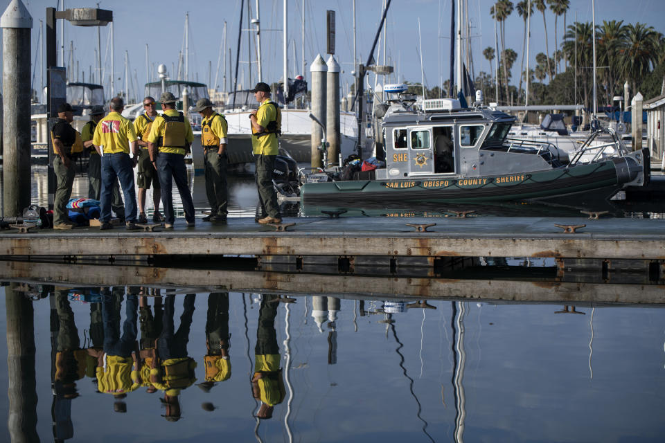 Divers with the San Luis Obispo County Sheriff's Dive Team prepare to search for a second day for missing people following a dive boat fire off Southern California's coast that killed dozens sleeping below deck, in Santa Barbara, Calif., Sept. 3, 2019. (Photo: Christian Monterrosa/AP)