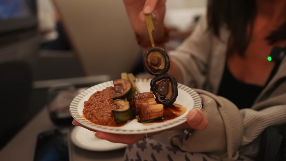 a plate of vegetable skewers