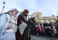 <p>Actors representing Mary and Joseph walk in Warsaw’s annual Epiphany procession in Warsaw, Poland, Saturday, Jan. 6, 2018. (Photo: Czarek Sokolowski/AP) </p>