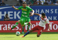 Soccer Football - Bundesliga - Hamburger SV v Borussia Moenchengladbach - Volksparkstadion, Hamburg, Germany - May 12, 2018 Borussia Monchengladbach's Josip Drmic in action with Hamburg's Douglas Santos REUTERS/Fabian Bimmer