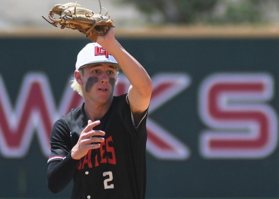 Lubbock-Cooper's Ethan Guerrero fields a ball at shortstop against Mansfield Legacy in Game 2 of their Region I-5A semifinal series Saturday, May 28, 2022, at Walt Driggers Field in Abilene.