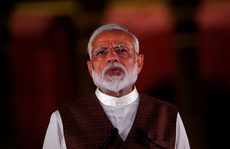 FILE PHOTO: India's Prime Minister Narendra Modi speaks to the media after his meeting with President Ram Nath Kovind, to stake claim to form the new government at the Presidential Palace in New Delhi