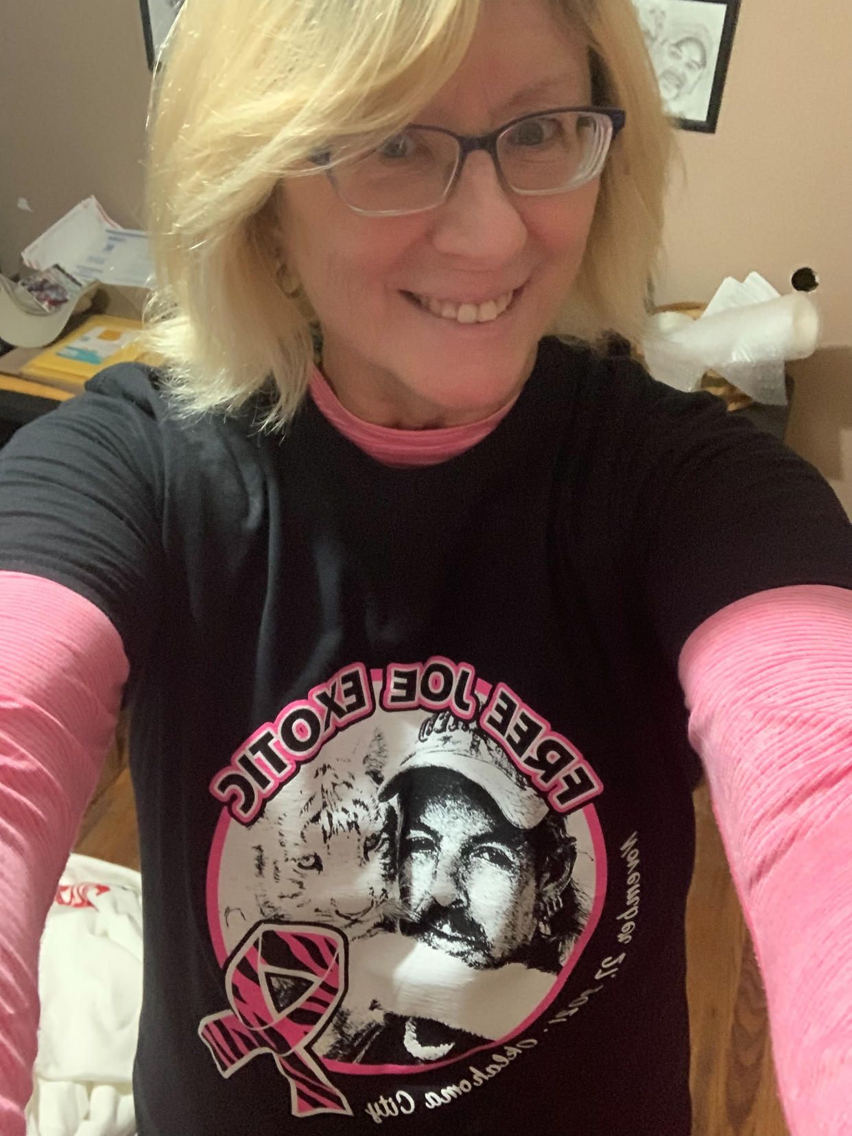 Tami Springer wears one of the "Tiger King" t-shirts available on the website she created and manages for the subject of the Netflix documentary, Joseph "Joe Exotic" Maldonado-Passage.