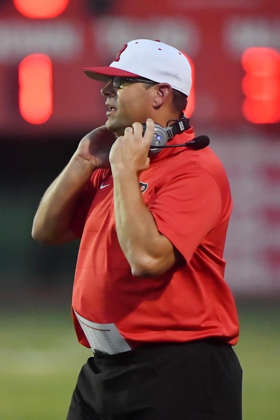 Rossville head coach Derick Hammes surveys the field.