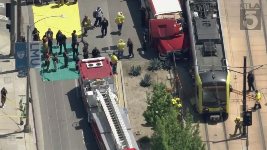 According to preliminary information released by the Los Angeles Fire Department, the crash occurred at 11:54 a.m. on Tuesday, April 29, on Exposition Boulevard between Normandie Avenue and Figueroa Street near the campus of USC. (KTLA)