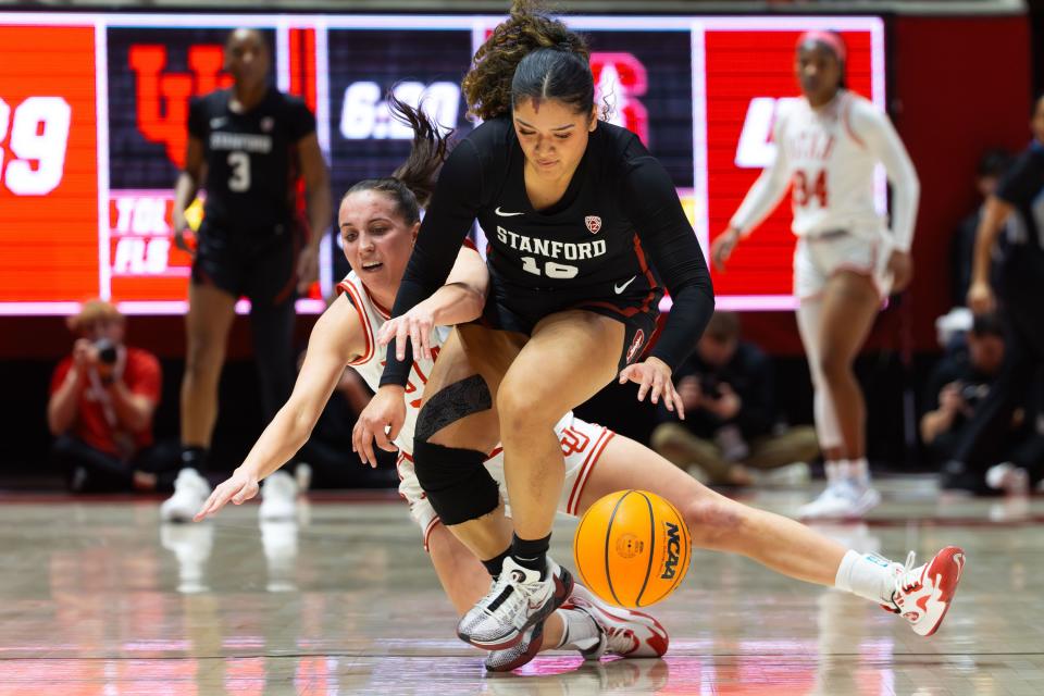 Utah Utes guard Kennady McQueen (24) and Stanford Cardinal guard Talana Lepolo (10) scramble for the ball during a college women’s basketball game between the Utah Utes and the Stanford Cardinal at the Jon M. Huntsman Center in Salt Lake City on Friday, Jan. 12, 2024. | Megan Nielsen, Deseret News