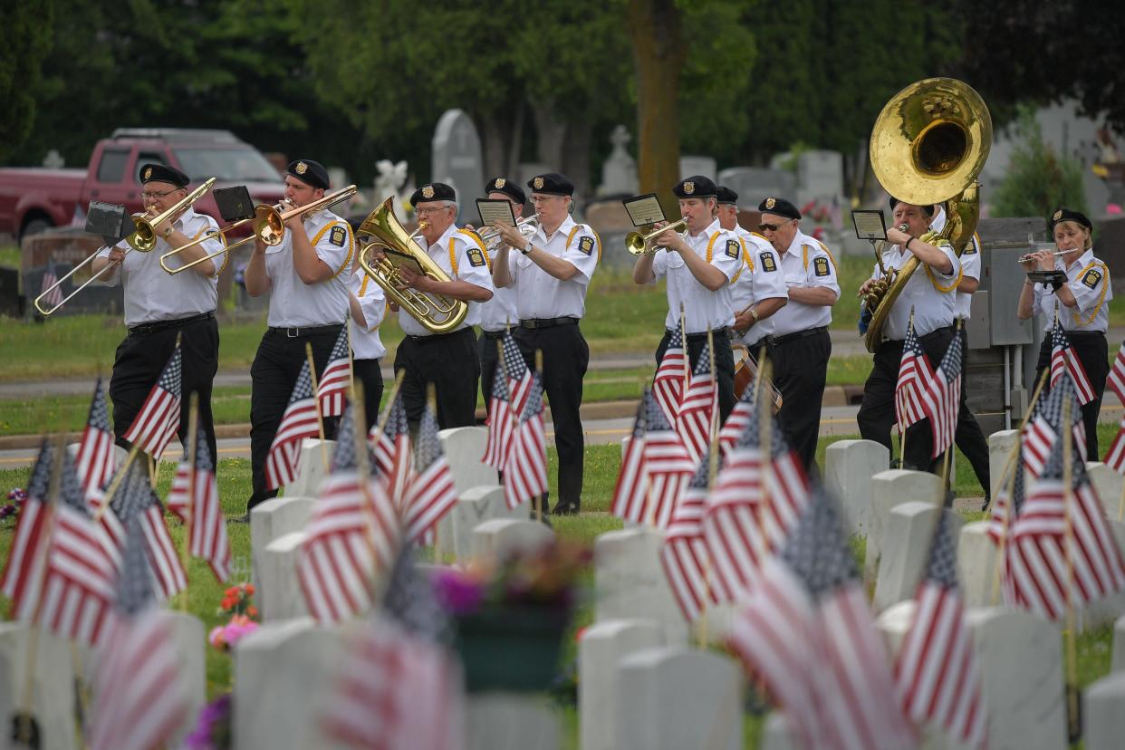 The Oshkosh Memorial Day Procession makes its way past hundreds of spectators along Algoma Boulevard before ending at Riverside Cemetery for the veterans ceremony in 2018.