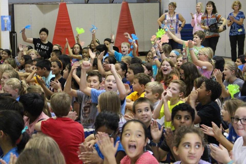 Fifth-grade students at Davis Drive Elementary in Cary celebrate the school being named a 2016 National Blue Ribbon School. U.S. News & World Report ranked Davis Drive as the No. 8 elementary school in North Carolina in its 2024 Best Schools list.