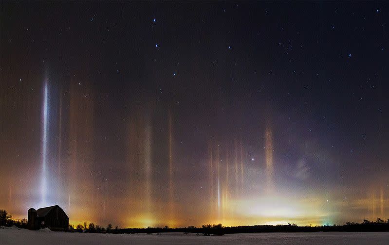 A panoramic photo of the light pillar phenomena. It was submitted in the Weather in Focus Photo Contest held by the U.S. National Weather Service by Matt Molloy in 2015. 
