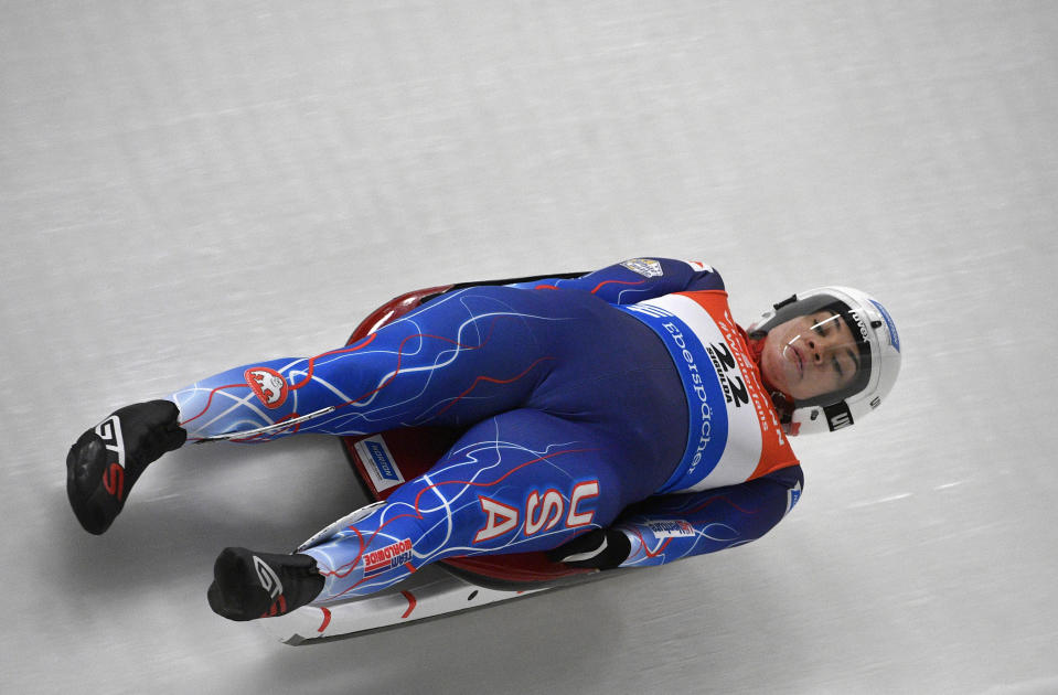 Summer Britcher of United States speeds down the track during a women's race at the Luge World Cup event in Sigulda, Latvia, Saturday, Jan. 12, 2019. (AP Photo/Roman Koksarov)