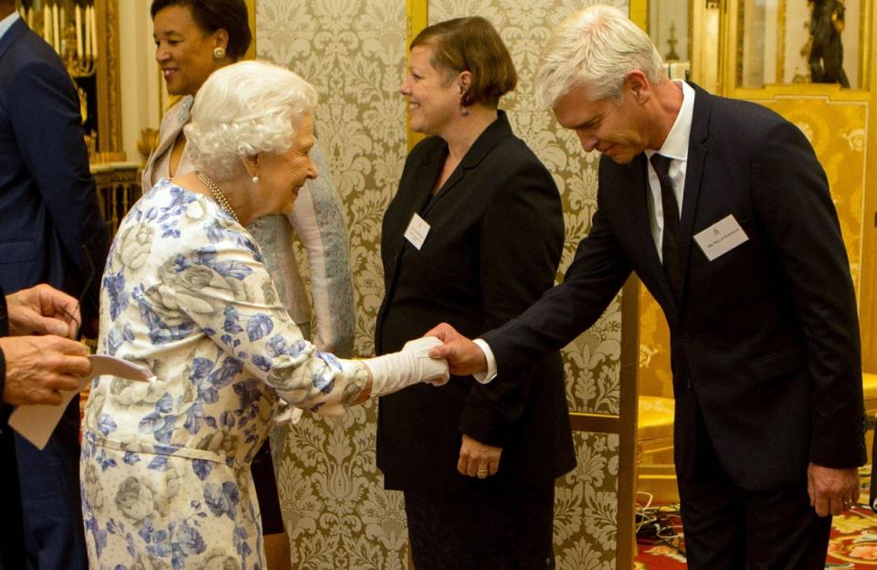 Phillip Schofield met the late Queen in 2016 (PA)