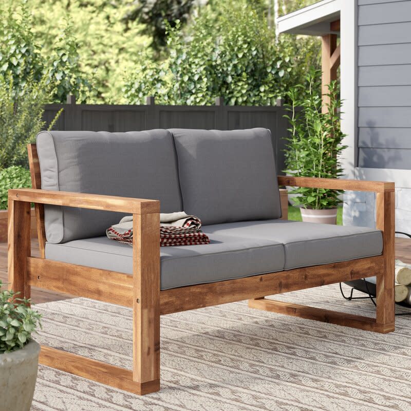 <p><a href="https://go.redirectingat.com?id=74968X1596630&url=https%3A%2F%2Fwww.wayfair.com%2Foutdoor%2Fpdp%2Fsand-stable-norris-loveseat-with-cushion-w006428354.html&sref=https%3A%2F%2Fwww.popularmechanics.com%2Fhome%2Fg39107603%2Fbest-affordable-patio-furniture%2F" rel="nofollow noopener" target="_blank" data-ylk="slk:Shop Now;elm:context_link;itc:0;sec:content-canvas" class="link ">Shop Now</a></p><p>Norris Wooden Loveseat with Cushions</p><p>$346.99</p><p>wayfair.com</p>