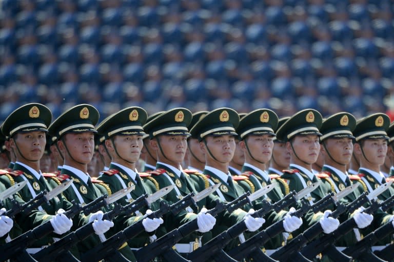 Chinese soldiers march in formation during a military parade in Tiananmen Square in Beijing on September 3, 2015, to mark the 70th anniversary of victory over Japan and the end of World War II